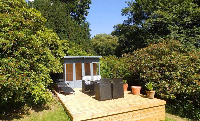 Summer house and decking with gas BBQ